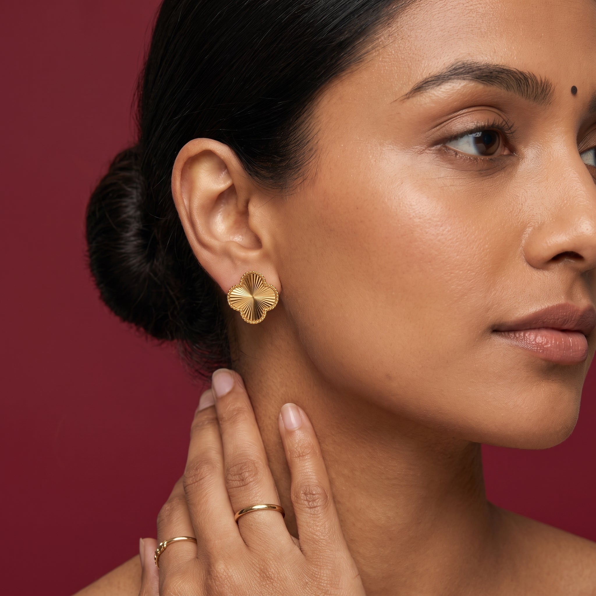 Golden Radiance Clover Earrings